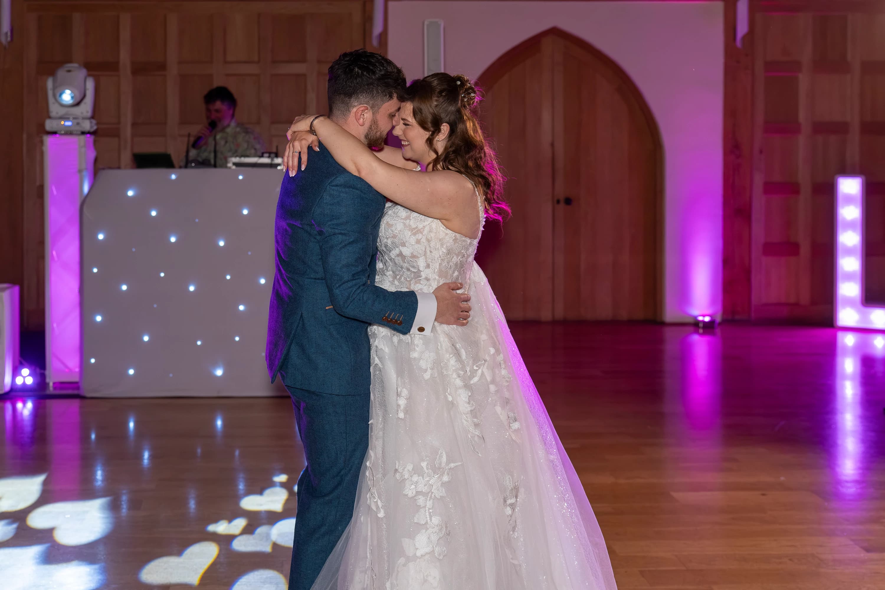 Charlie and Luke cutting their wedding cake