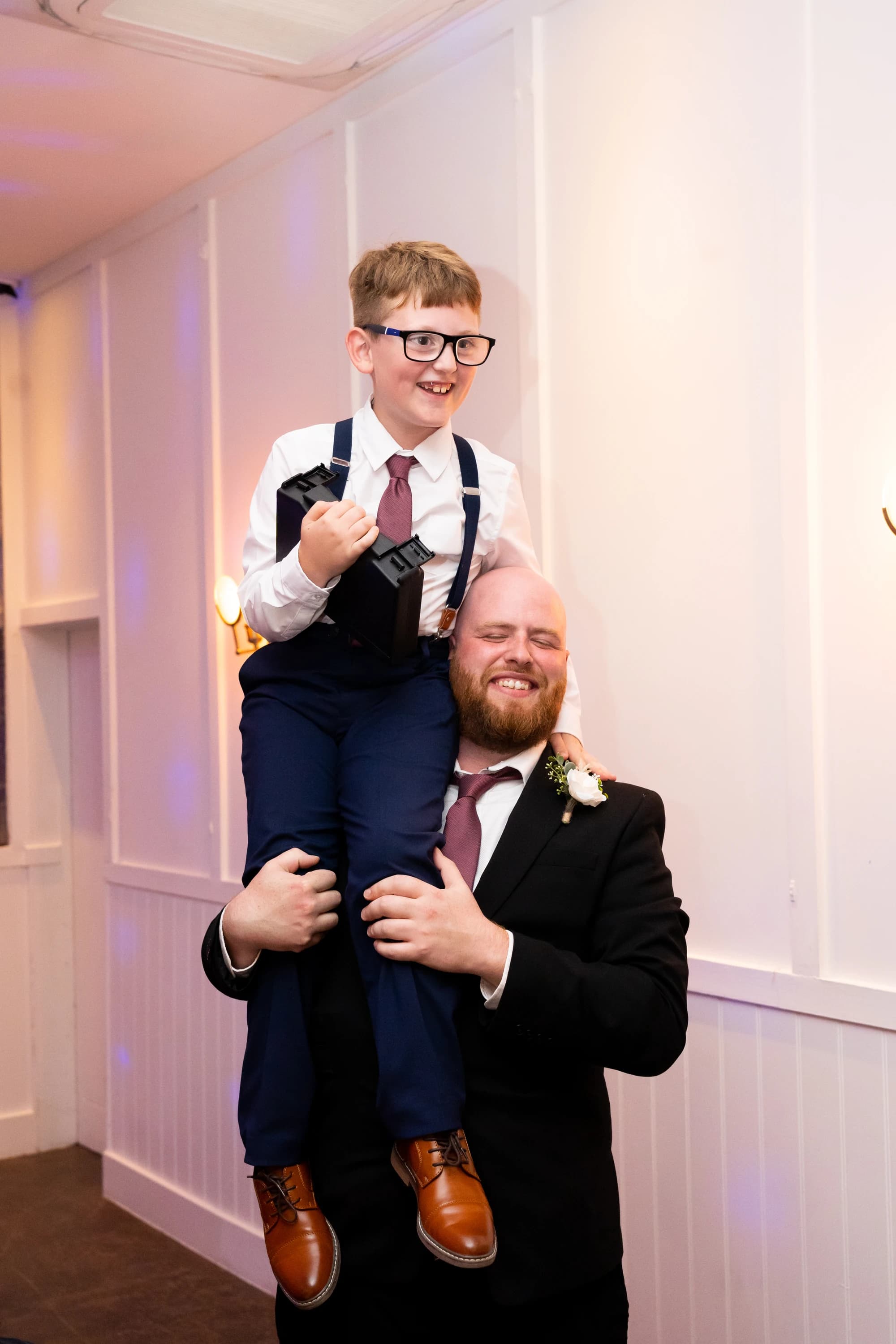 A joyful candid moment with Steve and a young guest