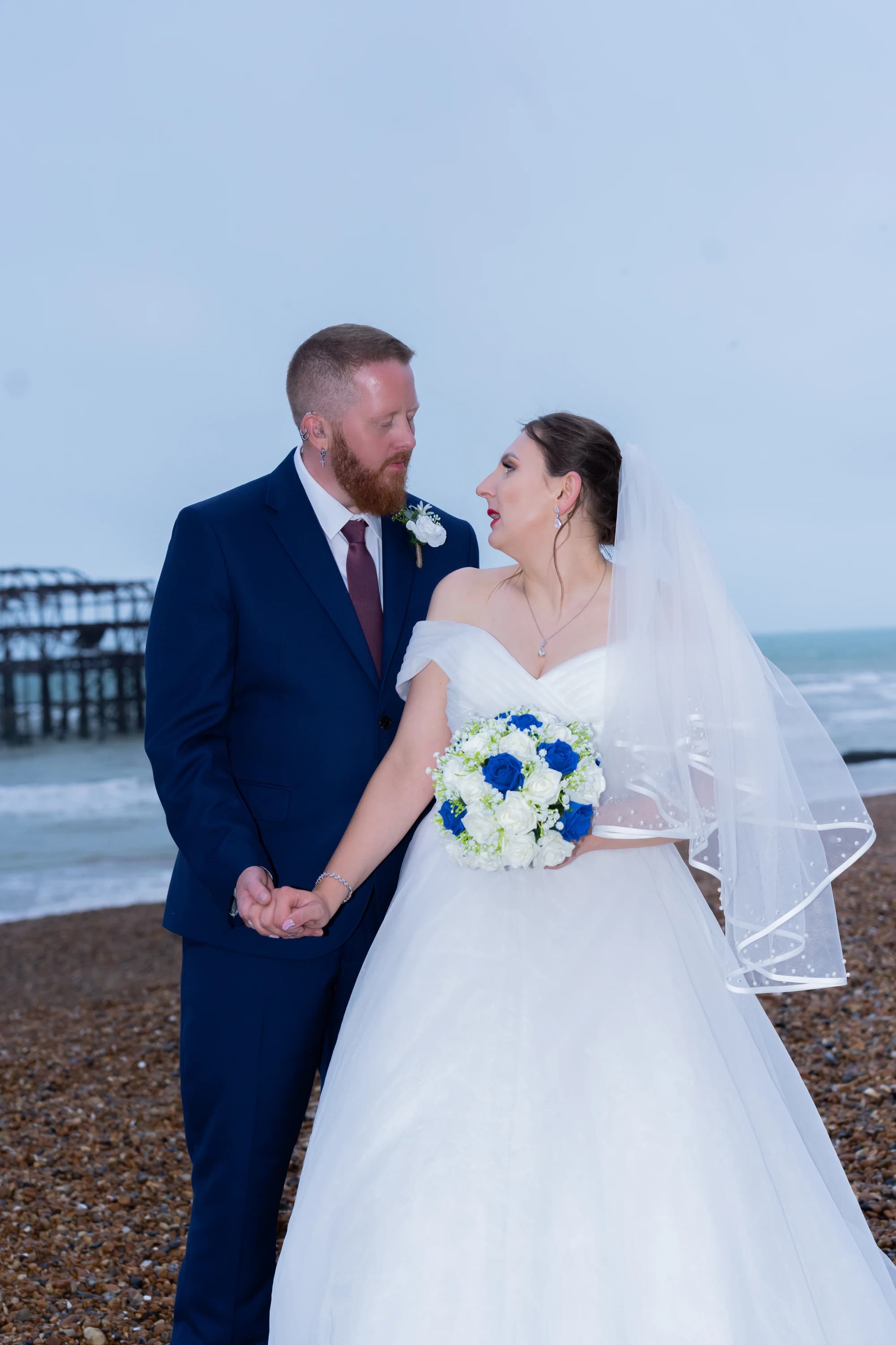 A close seaside portrait of Ineta and Steve