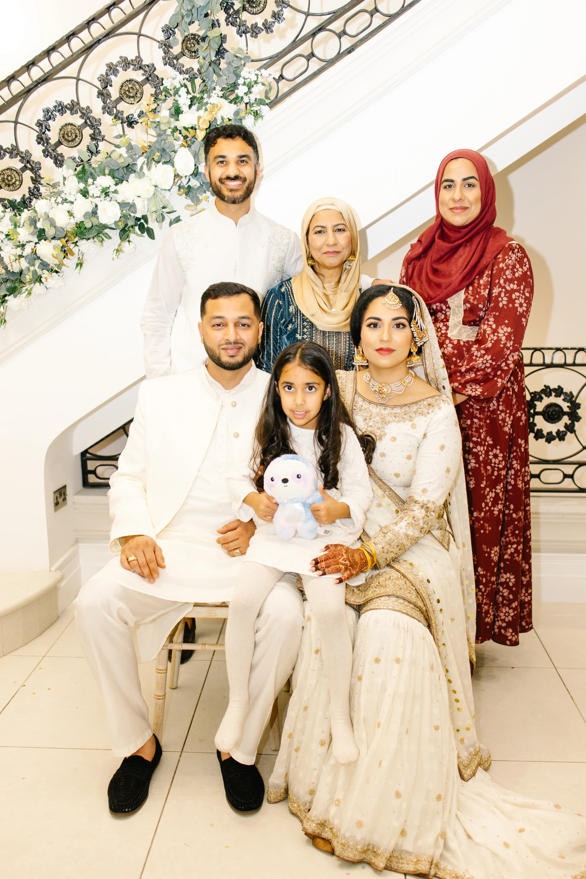 Umul and Zuhaer celebrating with family