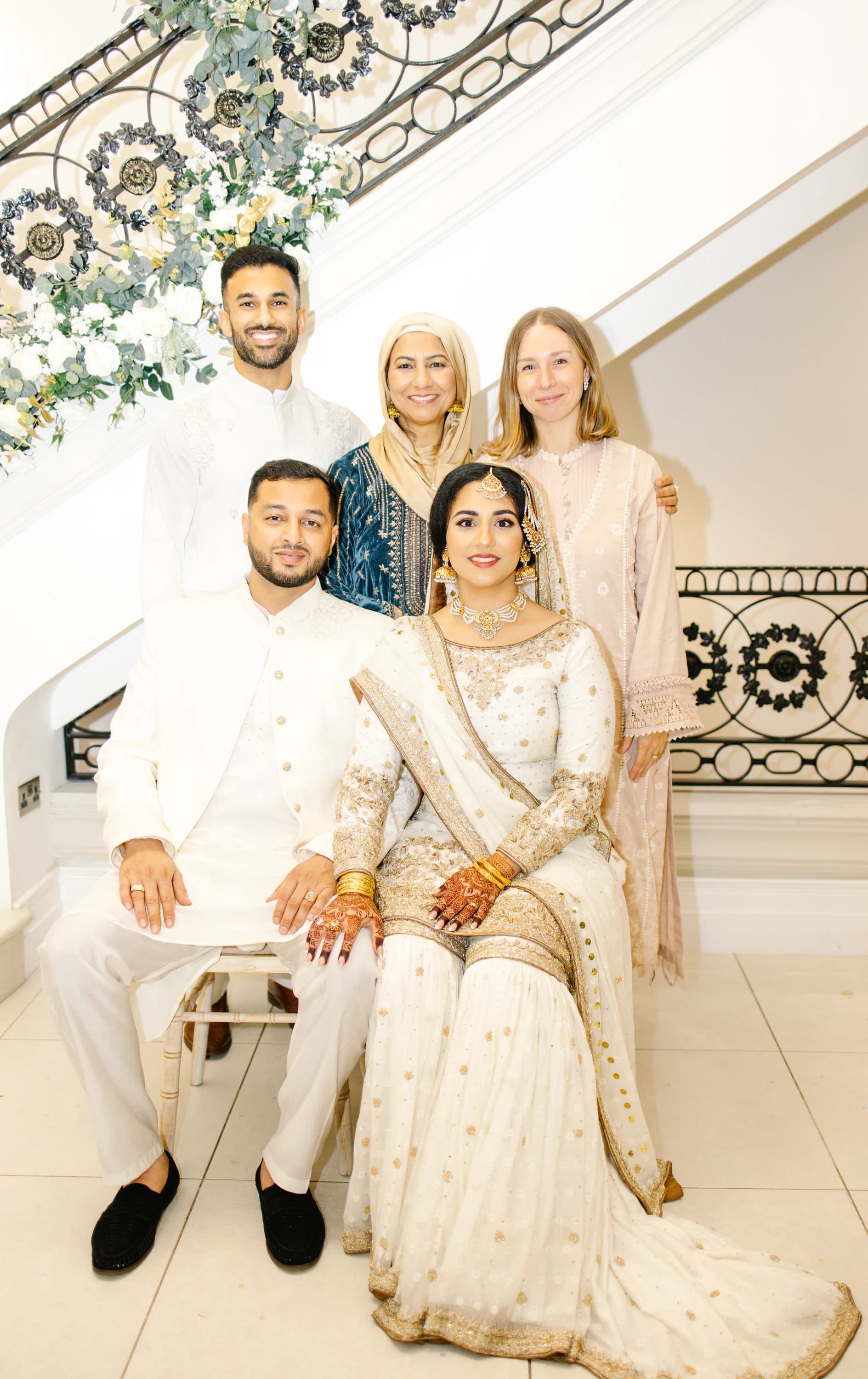 A joyful family portrait at Umul and Zuhaer’s wedding